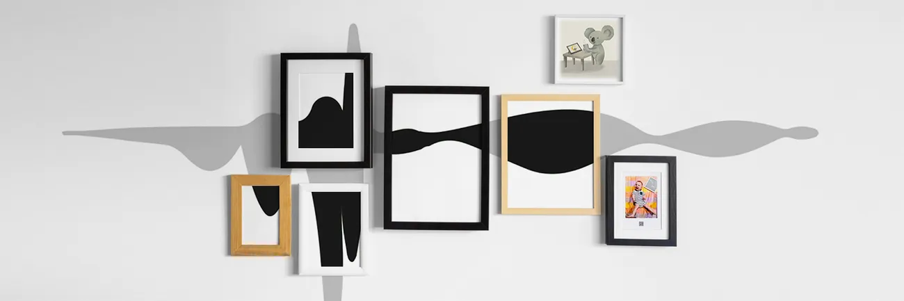 Framed sound-wave prints hanging on a wall